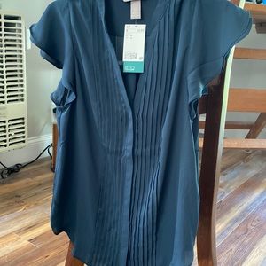 Unique blue, gray, pleated blouse.
